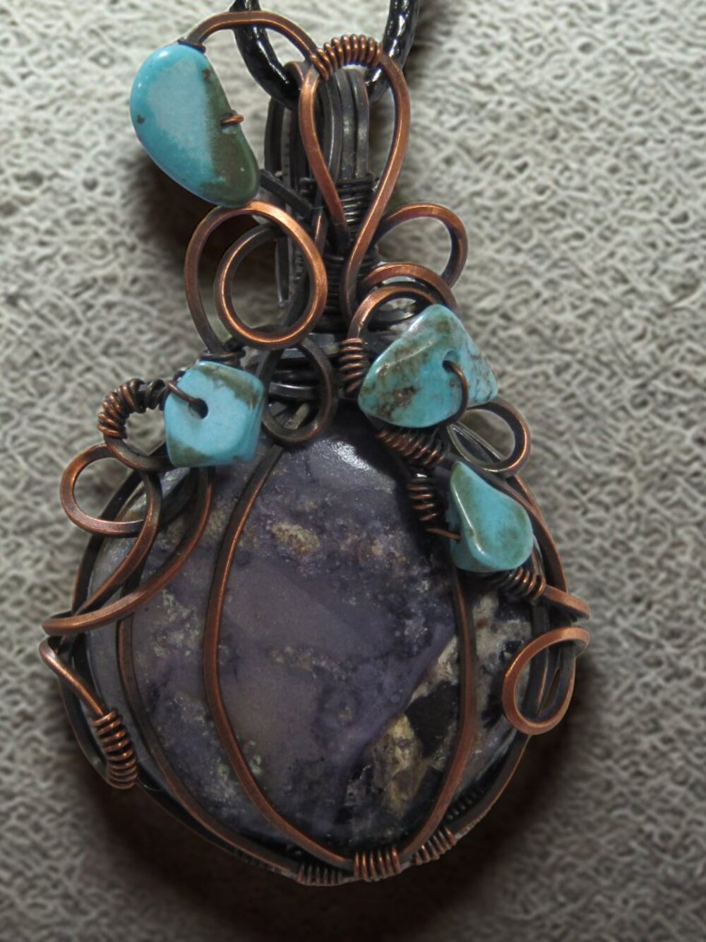 Handmade Wire Wrapped Tiffany Stone / Turquoise stone pendant. Raw Copper Wire